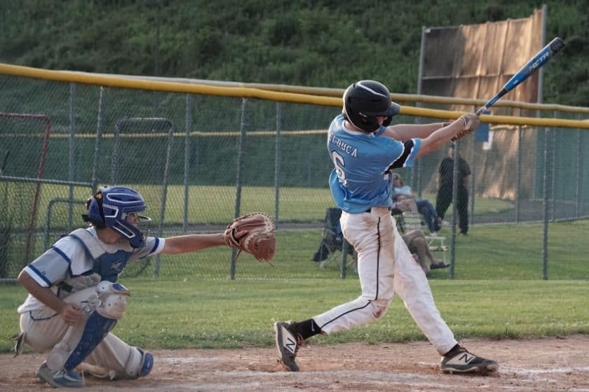 baseball player and catcher at bat