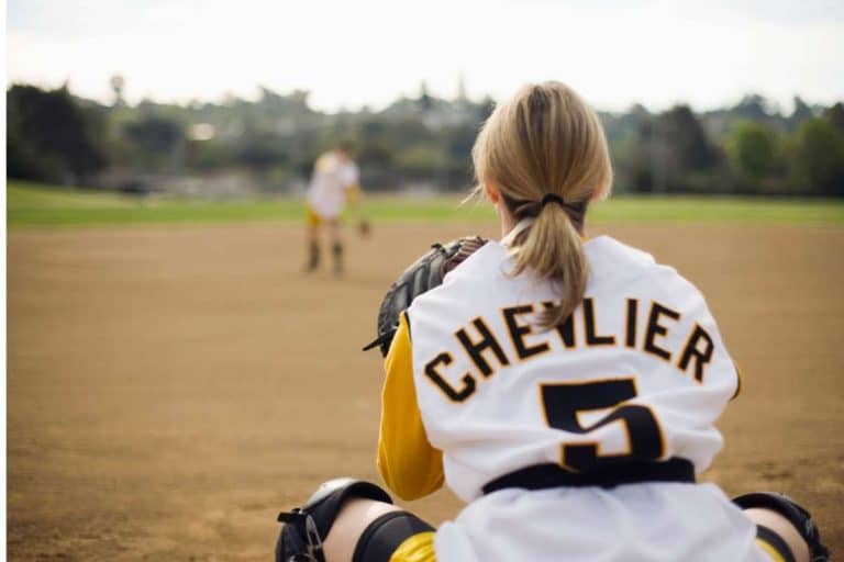 Why Do Softball Players Have Long Hair? (3 Great Reasons)